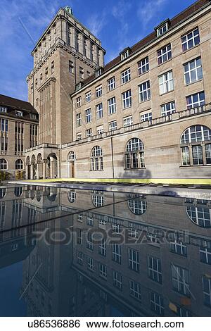 University of Zurich building reflecting in pond View Large Photo Image Stock Photograph - University of Zurich building reflecting in pond. Fotosearch