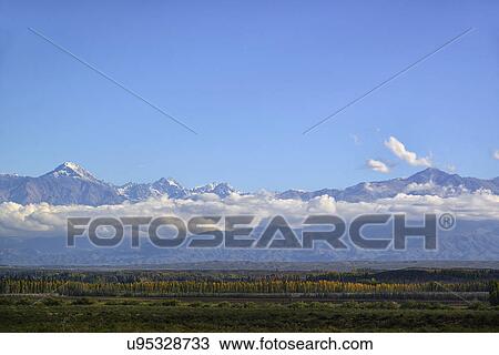 View of Andes Mountains across Uco Valley View Large Photo Image Stock Image - View of Andes Mountains across Uco Valley. Fotosearch