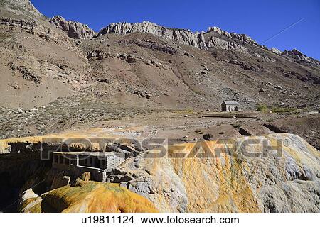 View old building under natural bridge in valley and church in distant View Large Photo Image Picture - View old building under natural bridge in valley and church in distant. Fotosearch