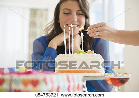 Woman and birthday cake View Large Photo Image Stock Image - Woman and birthday cake. Fotosearch