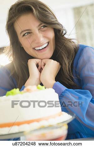 Woman and birthday cake View Large Photo Image Stock Photo - Woman and birthday cake. Fotosearch