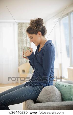 Woman at home with mug View Large Photo Image Stock Image - Woman at home with mug . Fotosearch