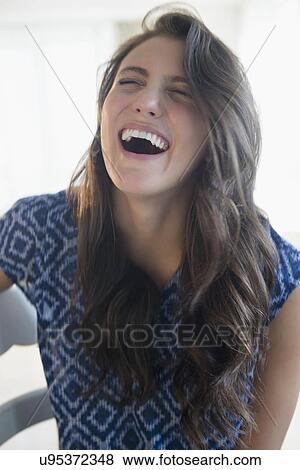 Woman laughing View Large Photo Image Stock Photo - Woman laughing. Fotosearch