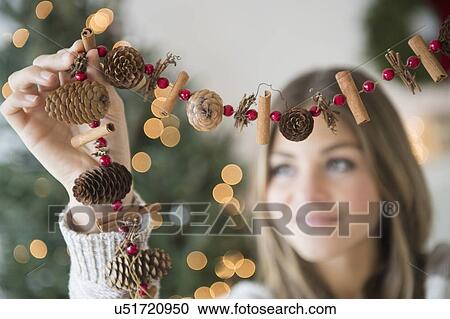 Woman preparing christmas decoration View Large Photo Image Stock Image - Woman preparing christmas decoration. Fotosearch