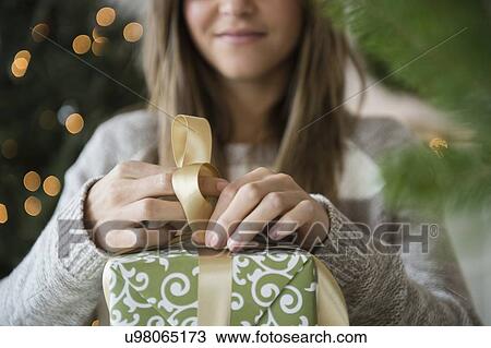 Woman preparing christmas gifts View Large Photo Image Stock Image - Woman preparing christmas gifts. Fotosearch