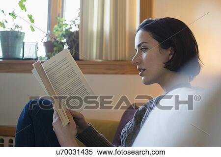 Stock Photography - Woman reading book. Fotosearch