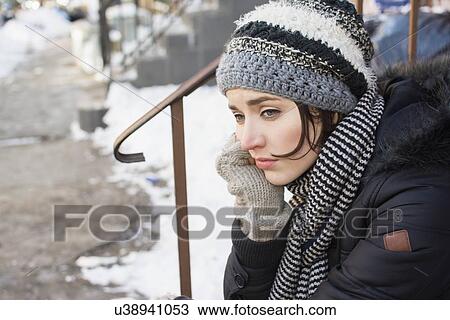 Woman sitting on steps thinking View Large Photo Image Stock Image - Woman sitting on steps thinking. Fotosearch