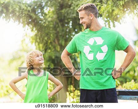 Young man face to face with his brother (8-9) in garden View Large Photo Image Stock Photo - Young man face to face with his brother (8-9) in garden. Fotosearch