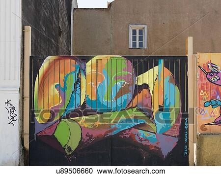 Stock Image - "Abstract Mural on fence, Valparaiso, Chile". Fotosearch