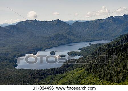 Stock Photograph - "Aerial view of a lake, Skeena-Queen Charlotte Regional District, Haida Gwaii, Graham Island, British Columbia, Canada". Fotosearch