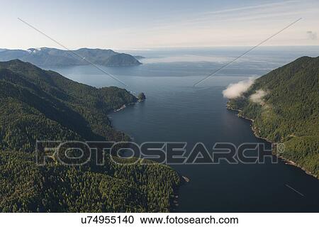 Stock Image - "Aerial view of islands in the Pacific Ocean, Skeena-Queen Charlotte Regional District, Haida Gwaii, Graham Island, British Columbia, Canada". Fotosearch