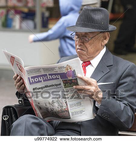 "Businessman reading newspaper, Santiago, Santiago Metropolitan Region, Chile" View Large Photo Image Stock Image - "Businessman reading newspaper, Santiago, Santiago Metropolitan Region, Chile". Fotosearch