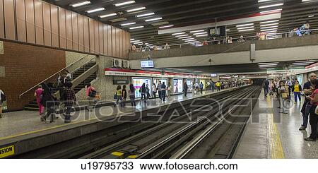 Stock Image - "Commuters at Santiago Metro station, Santiago, Santiago Metropolitan Region, Chile". Fotosearch