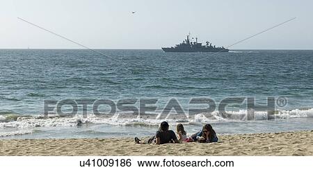 "Family relaxing on the beach, Vina Del Mar, Chile" View Large Photo Image Stock Photograph - "Family relaxing on the beach, Vina Del Mar, Chile". Fotosearch
