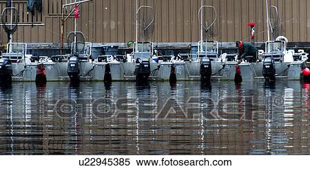 Stock Photography - "Fishing boats at a dock, Skeena-Queen Charlotte Regional District, Haida Gwaii, Graham Island, British Columbia, Canada". Fotosearch