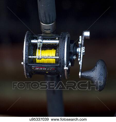 Stock Photo - "Fishing reel, Skeena-Queen Charlotte Regional District, Haida Gwaii, Graham Island, British Columbia, Canada". Fotosearch