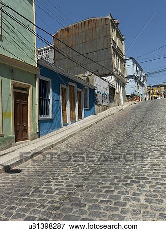 "Houses along a cobblestone sloped street, Valparaiso, Chile" View Large Photo Image Stock Photo - "Houses along a cobblestone sloped street, Valparaiso, Chile". Fotosearch