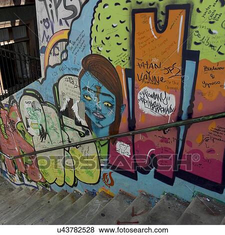 Stock Photo - "Murals on wall along staircase, Valparaiso, Chile". Fotosearch