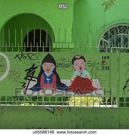 Stock Photo - "Paintings on wall fence, Calle Antonia Lopez de Bello, Santiago, Santiago Metropolitan Region, Chile". Fotosearch