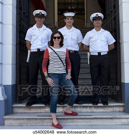 "Portrait of a woman with three soldiers guard at the entrance, Valparaiso, Chile" View Large Photo Image Stock Photo - "Portrait of a woman with three soldiers guard at the entrance, Valparaiso, Chile". Fotosearch
