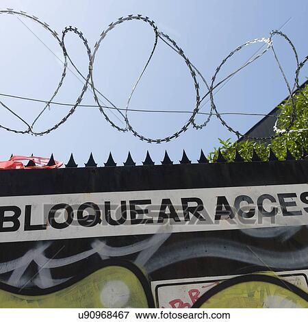 "Razor wire fence, Valparaiso, Chile" View Large Photo Image Stock Photo - "Razor wire fence, Valparaiso, Chile". Fotosearch