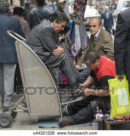 "Shoe polisher and customers, Santiago, Santiago Metropolitan Region, Chile" View Large Photo Image Stock Photo - "Shoe polisher and customers, Santiago, Santiago Metropolitan Region, Chile". Fotosearch