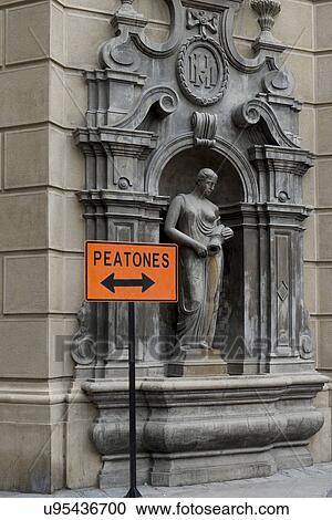 "Sign in front of carving wall, Santiago, Santiago Metropolitan Region, Chile" View Large Photo Image Stock Image - "Sign in front of carving wall, Santiago, Santiago Metropolitan Region, Chile". Fotosearch