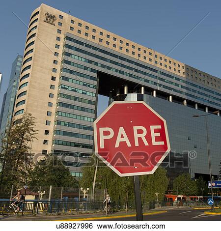 Stock Photograph - "Stop sign in front of a building, Santiago, Santiago Metropolitan Region, Chile". Fotosearch