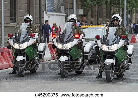 "Three policemen on motorcycles on the street, Santiago, Santiago Metropolitan Region, Chile" View Large Photo Image Stock Photography - "Three policemen on motorcycles on the street, Santiago, Santiago Metropolitan Region, Chile". Fotosearch