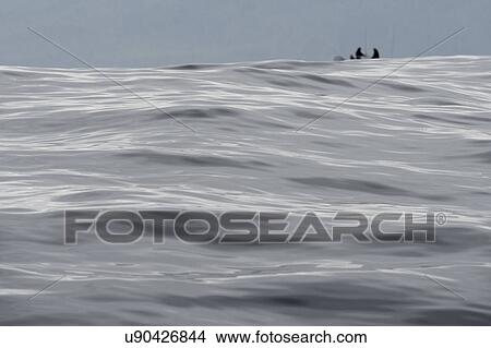 Picture - "Tourist fishing in the Pacific Ocean, Skeena-Queen Charlotte Regional District, Haida Gwaii, Graham Island, British Columbia, Canada". Fotosearch