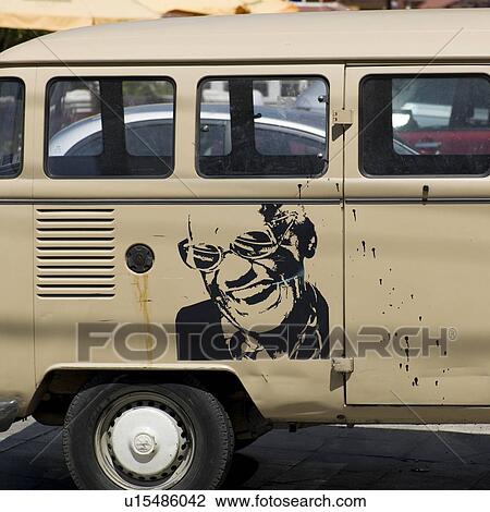 Stock Image - "Van with a mural of a man, Valparaiso, Chile". Fotosearch