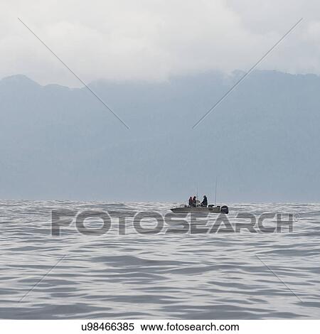 "View of fishermen in a boat, Skeena-Queen Charlotte Regional District, Hippa Island, Haida Gwaii, Graham Island, British Columbia, Canada" View Large Photo Image Stock Photography - "View of fishermen in a boat, Skeena-Queen Charlotte Regional District, Hippa Island, Haida Gwaii, Graham Island, British Columbia, Canada". Fotosearch