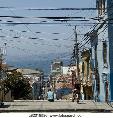 "View of street with houses towards ocean, Valparaiso, Chile" View Large Photo Image Stock Photograph - "View of street with houses towards ocean, Valparaiso, Chile". Fotosearch