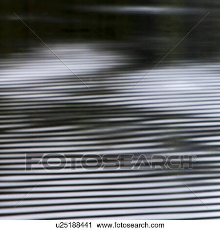 Stock Image - "Wave pattern, Skeena-Queen Charlotte Regional District, Haida Gwaii, Graham Island, British Columbia, Canada". Fotosearch