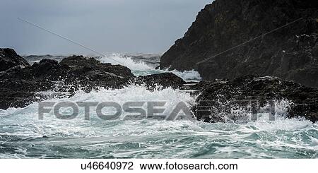 Stock Image - "Waves breaking on the coast, Skeena-Queen Charlotte Regional District, Haida Gwaii, Graham Island, British Columbia, Canada". Fotosearch