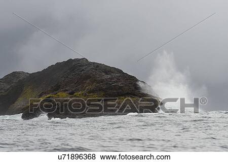 Stock Photo - "Waves breaking on the coast, Skeena-Queen Charlotte Regional District, Haida Gwaii, Graham Island, British Columbia, Canada". Fotosearch