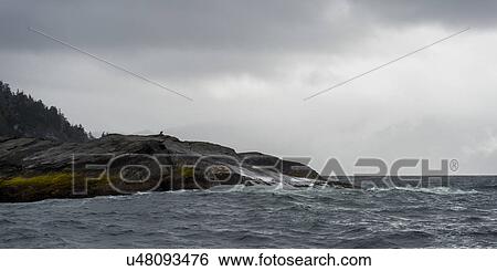 Stock Photograph - "Waves breaking on the coast, Skeena-Queen Charlotte Regional District, Haida Gwaii, Graham Island, British Columbia, Canada". Fotosearch