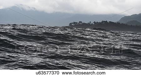 Stock Image - "Waves in the Pacific Ocean, Skeena-Queen Charlotte Regional District, Haida Gwaii, Graham Island, British Columbia, Canada". Fotosearch