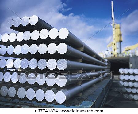 Picture - Aluminium bars on quayside in port. Fotosearch