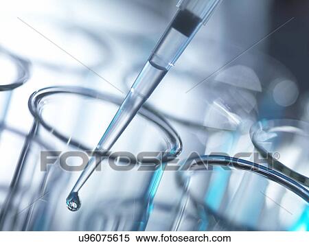 Stock Photography - "Analytical chemistry, sample being pipetted into a test tube for testing in laboratory". Fotosearch
