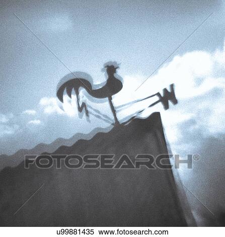 Stock Photography - Art photograph of weather vane cockerel. Fotosearch
