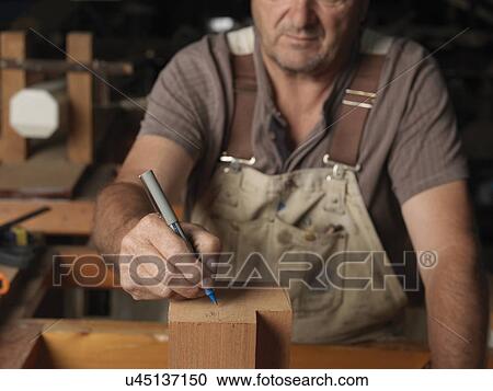 Boat builder in workshop View Large Photo Image Stock Image - Boat builder in workshop. Fotosearch