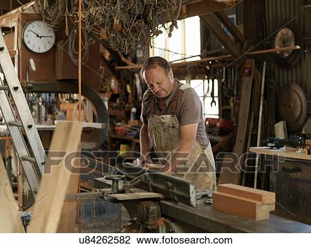 Boat builder in workshop View Large Photo Image Stock Image - Boat builder in workshop. Fotosearch