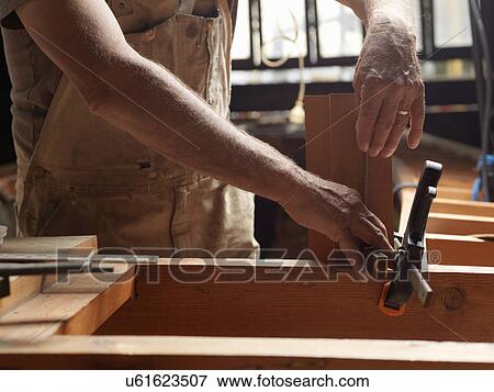 Boat builder in workshop View Large Photo Image Stock Photo - Boat builder in workshop. Fotosearch
