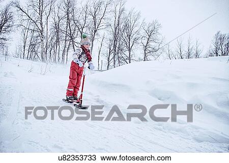 "Boy playing on snow scooter, Hemavan, Sweden" View Large Photo Image Stock Image - "Boy playing on snow scooter, Hemavan, Sweden". Fotosearch