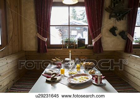 Breakfast table in log cabin View Large Photo Image Stock Photography - Breakfast table in log cabin. Fotosearch