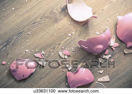 Stock Image - Broken piggy bank. Fotosearch