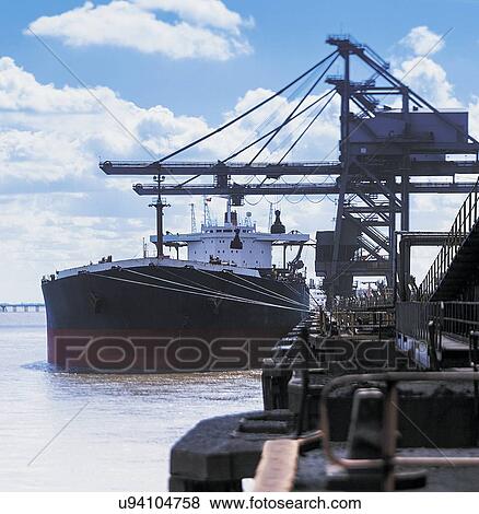 Bulk cargo ship moored at port View Large Photo Image Stock Photo - Bulk cargo ship moored at port. Fotosearch