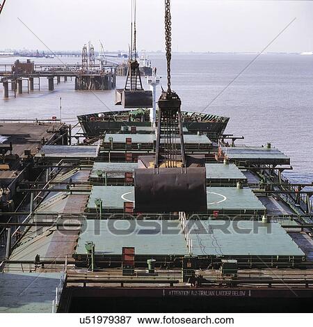 "Bulk coal ship about to be unloaded in port, Grimsby, England, United Kingdom" View Large Photo Image Stock Photo - "Bulk coal ship about to be unloaded in port, Grimsby, England, United Kingdom". Fotosearch