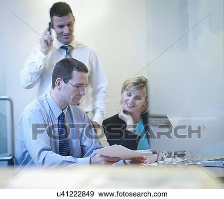 Business colleagues in meeting View Large Photo Image Stock Photo - Business colleagues in meeting. Fotosearch